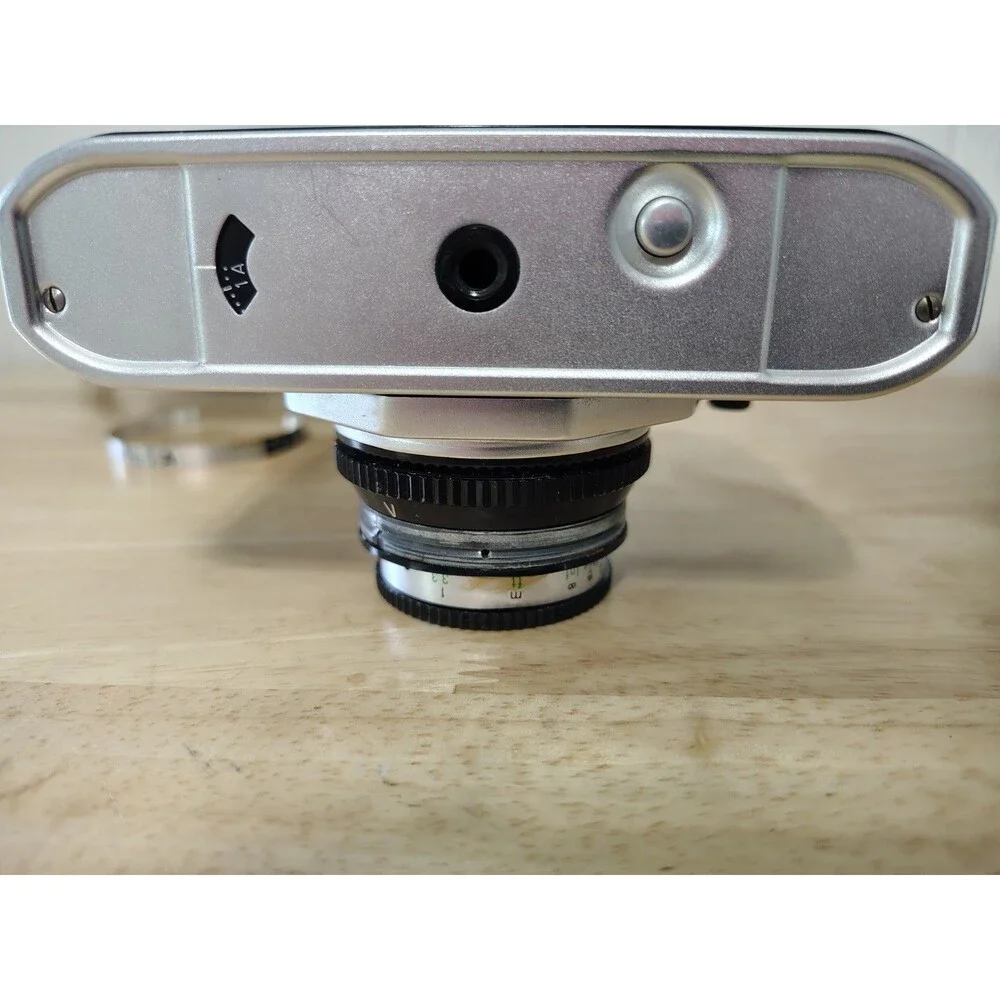 Regula Sprinty Camera with Rexar 45mm f/2.8 Lens and nice leather case read des